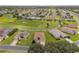 Aerial view of a residential community with golf course at 15596 Sw 13Th Cir, Ocala, FL 34473