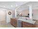 Kitchen boasts granite countertops, stainless steel appliances, and an island at 15596 Sw 13Th Cir, Ocala, FL 34473