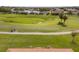 Aerial view of homes along a golf course at 15596 Sw 13Th Cir, Ocala, FL 34473