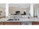 Modern kitchen with granite countertops and stainless steel appliances at 15596 Sw 13Th Cir, Ocala, FL 34473