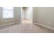 Empty bedroom with neutral walls and carpeted floor at 4555 Sw 52Nd Cir # 101, Ocala, FL 34474