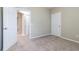 Spacious bedroom with neutral walls and carpet at 4555 Sw 52Nd Cir # 101, Ocala, FL 34474