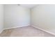 Empty bedroom with neutral walls and carpeted floor at 4555 Sw 52Nd Cir # 101, Ocala, FL 34474