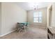 Charming dining room with a light teal table and two chairs at 4555 Sw 52Nd Cir # 101, Ocala, FL 34474