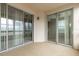 Enclosed balcony with sliding glass doors and view at 4555 Sw 52Nd Cir # 101, Ocala, FL 34474