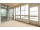 Bright enclosed patio with sliding glass doors and screens at 4555 Sw 52Nd Cir # 101, Ocala, FL 34474