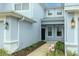Front entry of townhome with walkway and landscaping at 4555 Sw 52Nd Cir # 101, Ocala, FL 34474