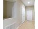 Interior hallway with tile flooring and neutral walls at 4555 Sw 52Nd Cir # 101, Ocala, FL 34474
