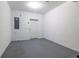 Spacious storage room with painted concrete floor at 4555 Sw 52Nd Cir # 101, Ocala, FL 34474