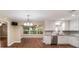 Updated kitchen with white cabinets and granite countertops at 9068 Sw 82Nd Ter # A, Ocala, FL 34481