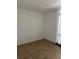 Simple bedroom with tiled floors and neutral-colored walls at 1 Willow Ct, Ocala, FL 34472
