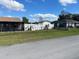 Home exterior showcasing a ranch-style home and detached garage at 1 Willow Ct, Ocala, FL 34472
