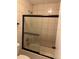 Clean bathroom with shower/tub combo and tile flooring at 1 Willow Ct, Ocala, FL 34472