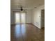 Spacious living area with tile flooring and access to patio at 1 Willow Ct, Ocala, FL 34472