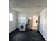 Laundry room with washer, dryer, and extra storage at 1 Willow Ct, Ocala, FL 34472