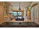 Spacious kitchen with granite countertops and large island at 1485 & 1525 Se 59Th St, Ocala, FL 34480
