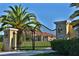 Ornate black gate leading to a large estate home with red tile roof at 1485 & 1525 Se 59Th St, Ocala, FL 34480