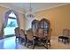 Elegant dining room with a chandelier and large window overlooking the backyard at 1485 & 1525 Se 59Th St, Ocala, FL 34480