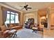 Spacious living area with large windows and a chandelier at 1485 Se 59Th St, Ocala, FL 34480
