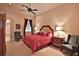Spacious bedroom with plush bedding and seating at 1485 Se 59Th St, Ocala, FL 34480