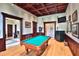 Spacious game room with pool table and wood accents at 1485 Se 59Th St, Ocala, FL 34480