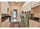 Spacious laundry room with ample cabinetry and workspace at 1485 Se 59Th St, Ocala, FL 34480