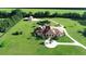 Aerial view of a luxurious house and expansive grounds at 1485 Se 59Th St, Ocala, FL 34480
