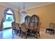 Elegant dining room with chandelier, large table and scenic views at 1485 Se 59Th St, Ocala, FL 34480