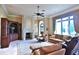 Bright living room with fireplace and comfortable seating at 1485 Se 59Th St, Ocala, FL 34480