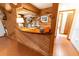 Custom wet bar with wood finishes, wine storage, and a unique countertop at 3630 Ne 67Th Ter, Silver Springs, FL 34488