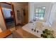 Bathroom with a large garden tub, shower, and a view to backyard at 3630 Ne 67Th Ter, Silver Springs, FL 34488