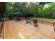 Large deck overlooking a wooded area, offering a relaxing space at 3630 Ne 67Th Ter, Silver Springs, FL 34488