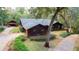 Aerial view of home showing driveway and landscaping at 3630 Ne 67Th Ter, Silver Springs, FL 34488