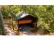 Detached workshop with an overhead door and ample storage at 3630 Ne 67Th Ter, Silver Springs, FL 34488