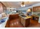 Open concept kitchen with island, granite countertops and stainless steel appliances at 3630 Ne 67Th Ter, Silver Springs, FL 34488