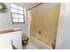 Simple bathroom featuring a bathtub and shower at 3630 Ne 67Th Ter, Silver Springs, FL 34488