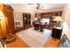 Home office with built-in shelving, hardwood floors, and a large desk at 3630 Ne 67Th Ter, Silver Springs, FL 34488