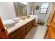 Clean bathroom with a vanity, shower, and bathtub at 3630 Ne 67Th Ter, Silver Springs, FL 34488