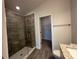 Bathroom with a large walk-in shower and a separate closet at 4489 Sw 90Th Pl, Ocala, FL 34476