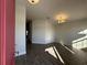 Bright living room with wood-look tile floors and a chandelier at 4489 Sw 90Th Pl, Ocala, FL 34476