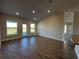 Bright and airy living room with high ceilings and access to the backyard at 4489 Sw 90Th Pl, Ocala, FL 34476