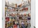 Well-organized pantry with ample shelving for storage at 4710 Sw 65Th Pl, Ocala, FL 34474