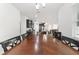 Dining room with a large wood table and seating for six at 4710 Sw 65Th Pl, Ocala, FL 34474