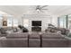 Open living area with comfortable seating and large TV at 4710 Sw 65Th Pl, Ocala, FL 34474