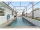 Long, refreshing pool with screened enclosure at 4710 Sw 65Th Pl, Ocala, FL 34474