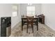 Bright dining room with wood table and seating for six at 4710 Sw 65Th Pl, Ocala, FL 34474