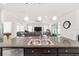 Spacious kitchen with island, stainless steel appliances, and granite countertops at 4710 Sw 65Th Pl, Ocala, FL 34474