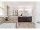 Spa-like bathroom with double vanity, soaking tub, and shower at 4710 Sw 65Th Pl, Ocala, FL 34474