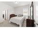 Bedroom with a full-size bed and dresser at 4710 Sw 65Th Pl, Ocala, FL 34474