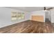 Bright living room featuring vinyl flooring and large windows at 903 Aloha Way, Lady Lake, FL 32159